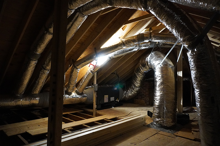 Newly installed ductwork in an attic